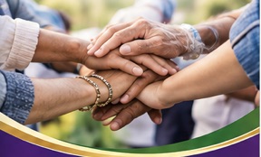 Community members joining hands